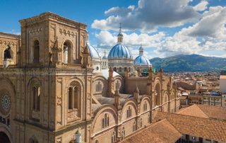Skyline of Cuenca, Ecuador featuring the Immaculate church.