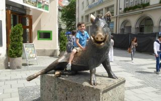 Jonah in Munich on Pig Statue