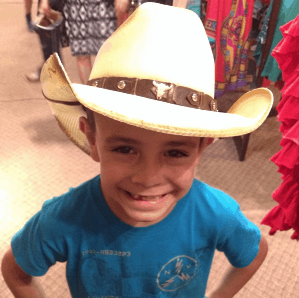 Trying on hats at the Stockyards